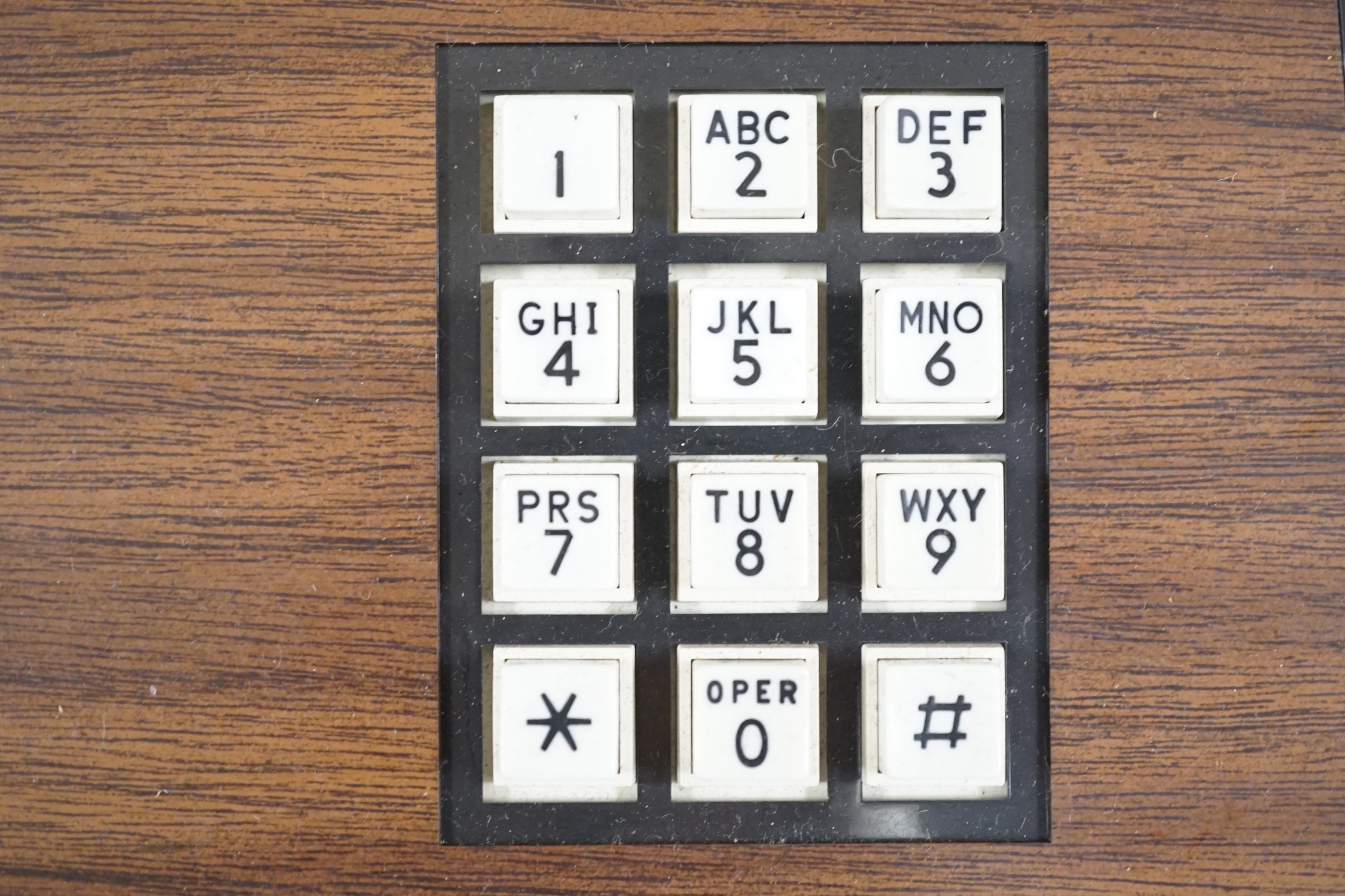 A Deco-Tel personal telephone set in hinged case